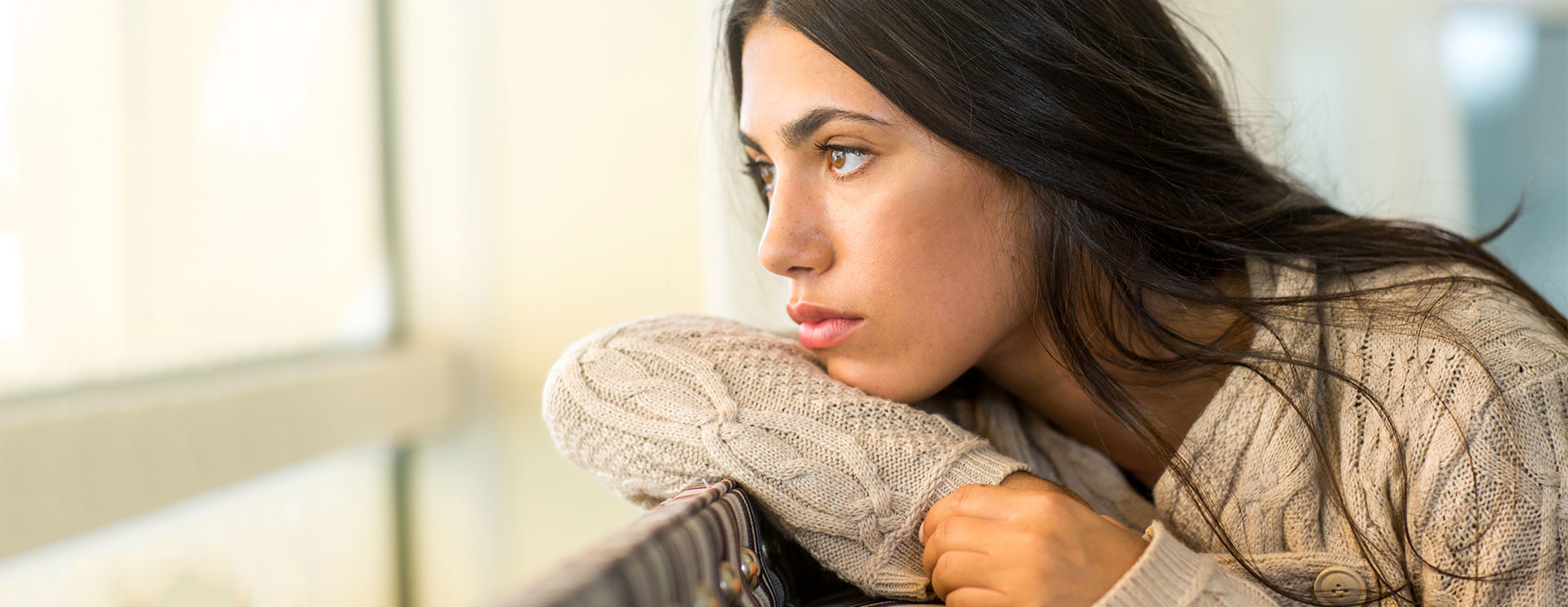 Someone considering what the signs of an incomplete abortion are