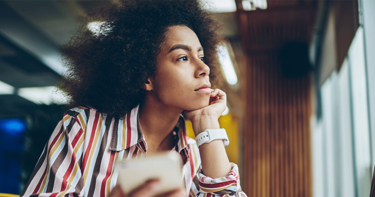 A woman thinking about medical abortion